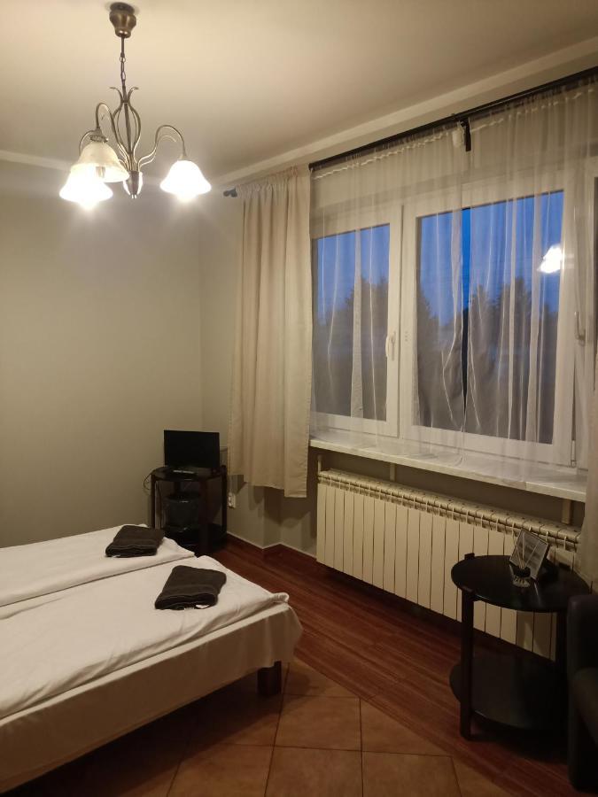 Pokoje Pod Swierkiem Swarzedz Bagian luar foto